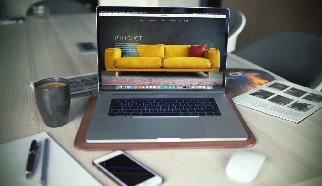 Image of a laptop displaying a product page