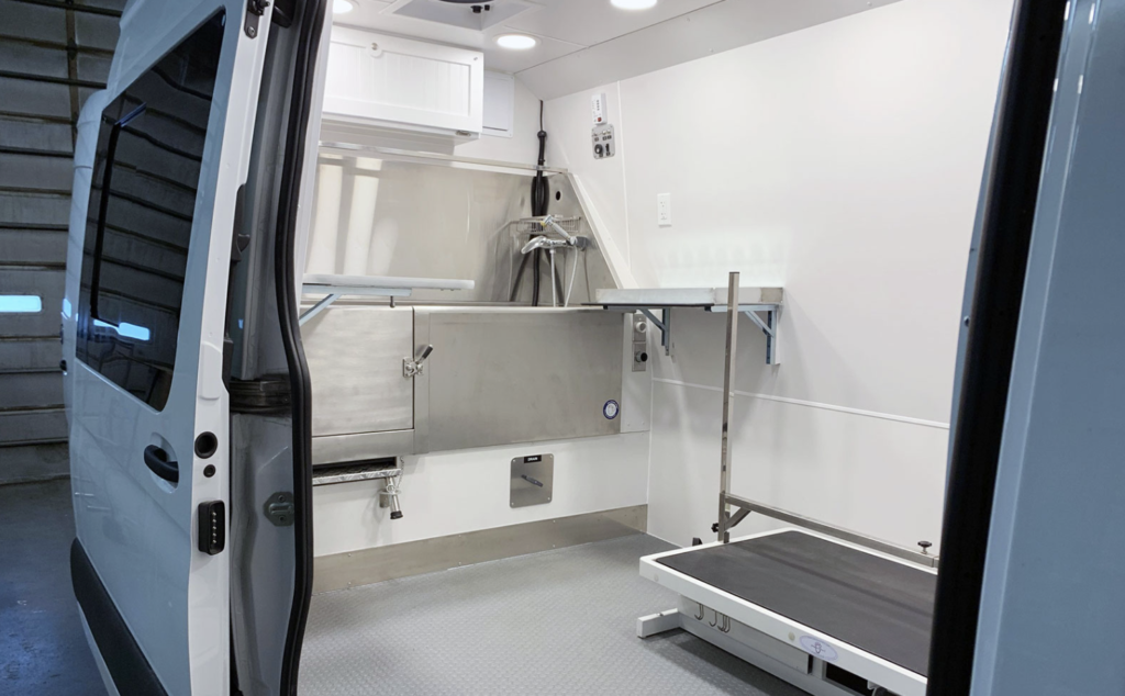 Image of a pet grooming van